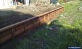 Damwand van hardhouten planken 